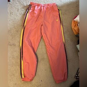 pink adidas pants, parachute pants, windbreaker material